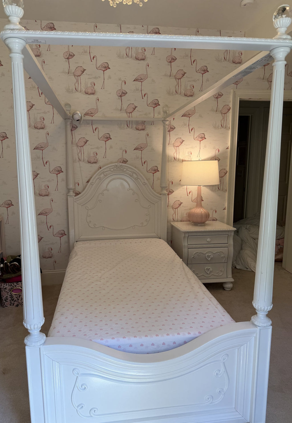 Sparkle White twin canopy bed, front view