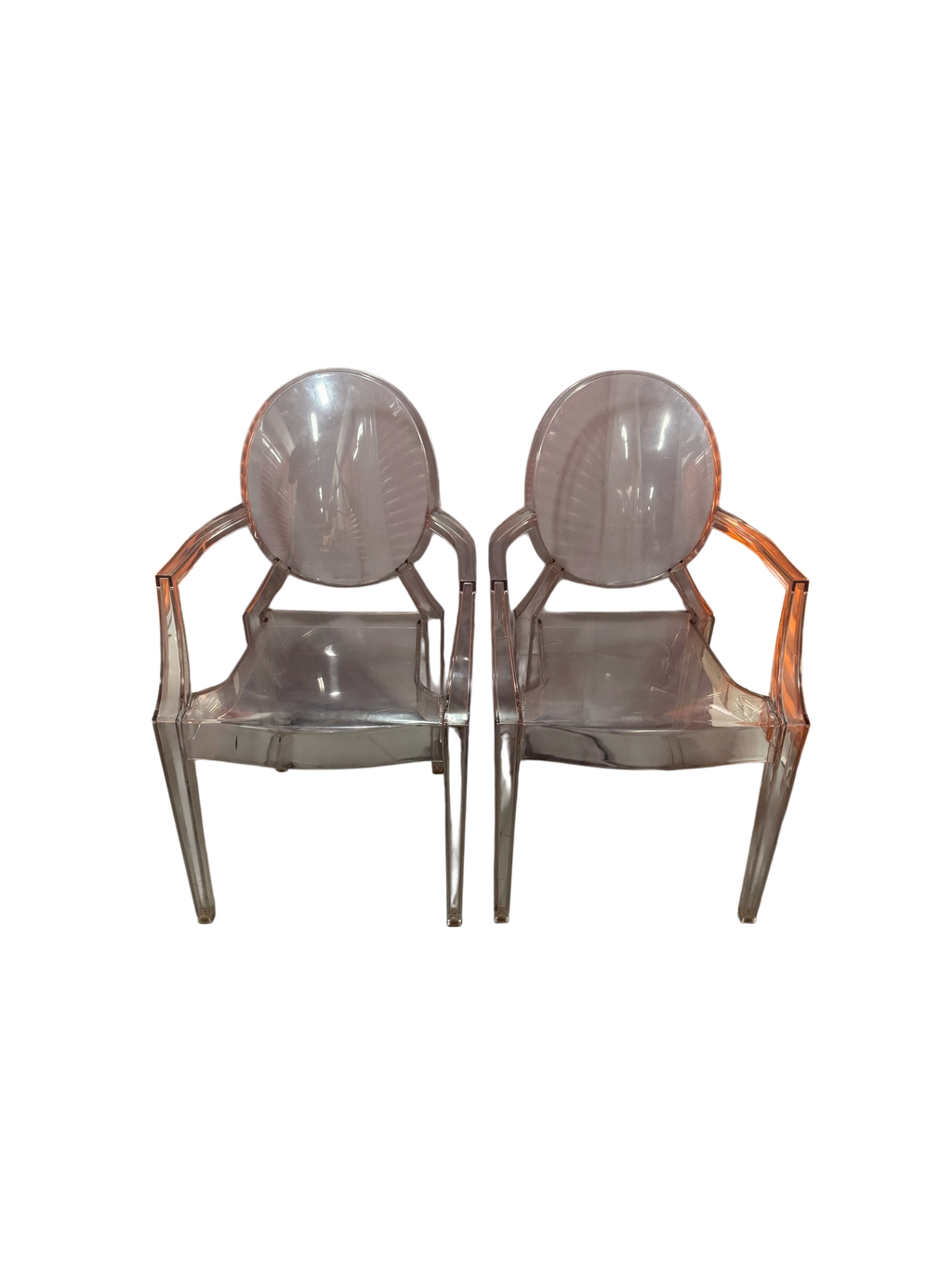Pair of clear armchairs side by side