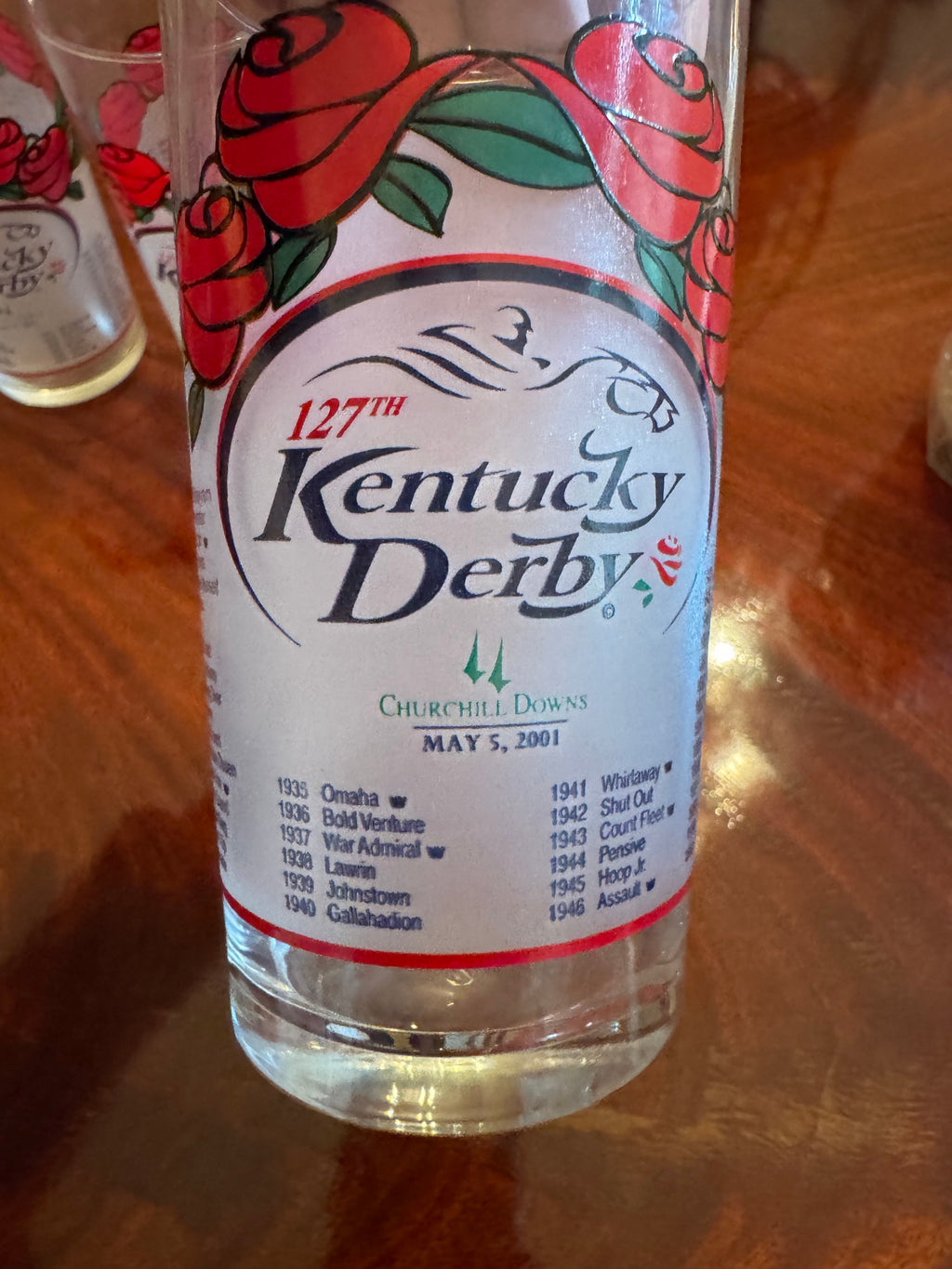 Close-up of Kentucky Derby 127th 2001 glass front label with jockey graphic and May 5, 2001 date
